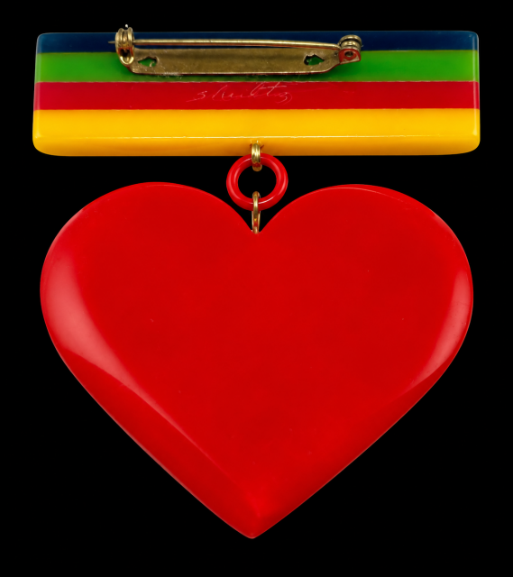 Shultz laminated bakelite bar/red heart pin